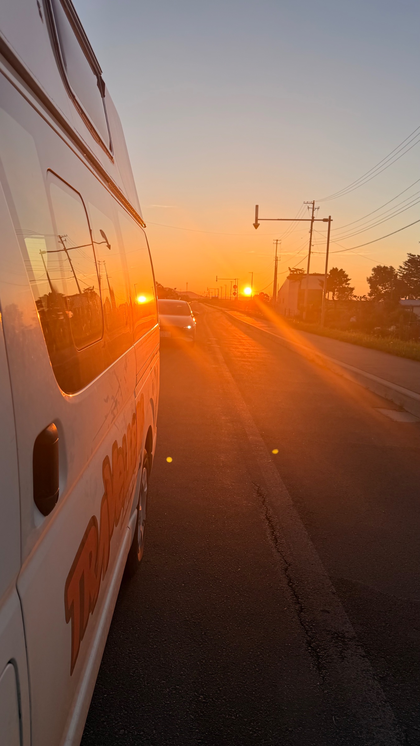 Sun setting on the van as we drove